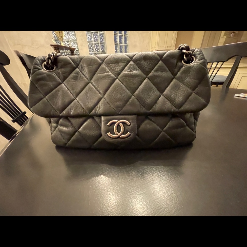 Authentic Chanel black quilted shoulder bag.
